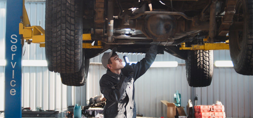 mechanic conducting car service supporting image2